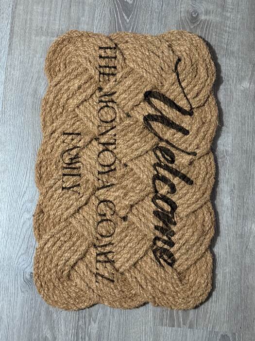 Laser-engraved welcome mat — custom family gift